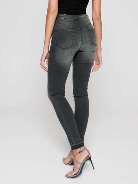 Modeling eco-friendly skinny jeans with high rise CON-225 Lycra® - buy in the online store Conte